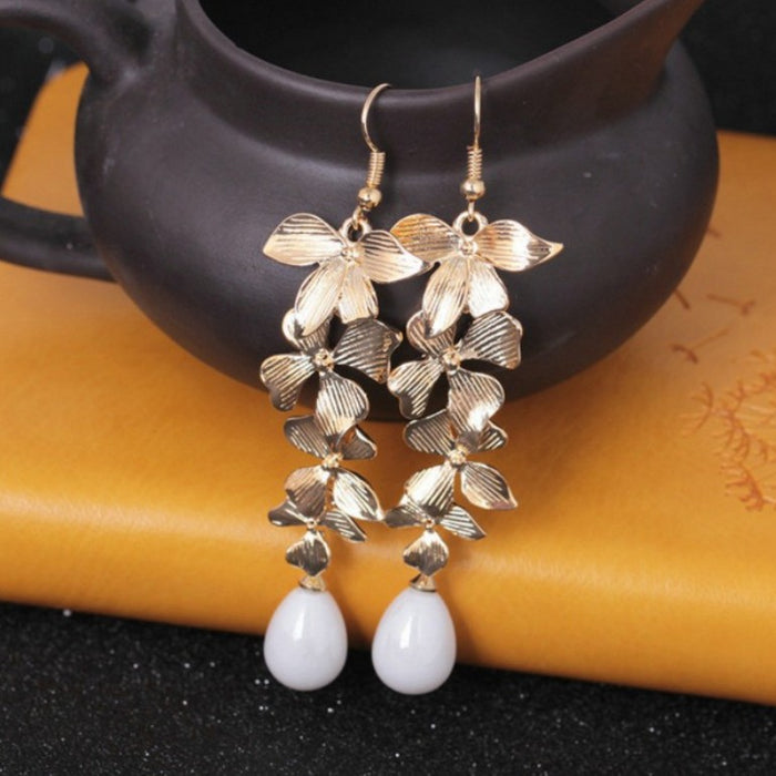 Wholesale Sweet flower pearl earrings long tassel gold orchid matte hook