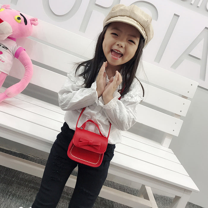Wholesale Children's crossbody bag, girls' bow, simple and fashionable baby single shoulder change accessory bag