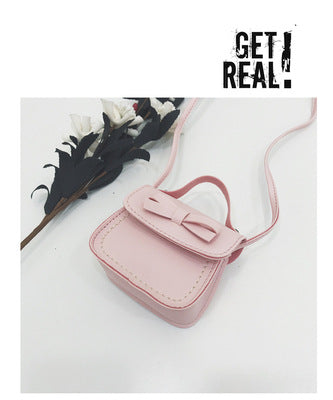 Wholesale Children's crossbody bag, girls' bow, simple and fashionable baby single shoulder change accessory bag
