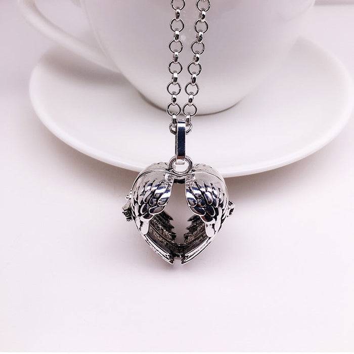 Wholesale Necklaces Alloy Heart Hollow Openable Essential Oil Aroma Diffuser JDC-NE-Yuz003