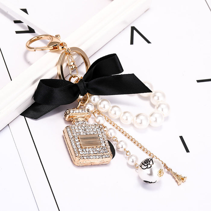 Wholesale Diamond Perfume Bottle Bow Pearl Alloy Keychain JDC-KC-CH120