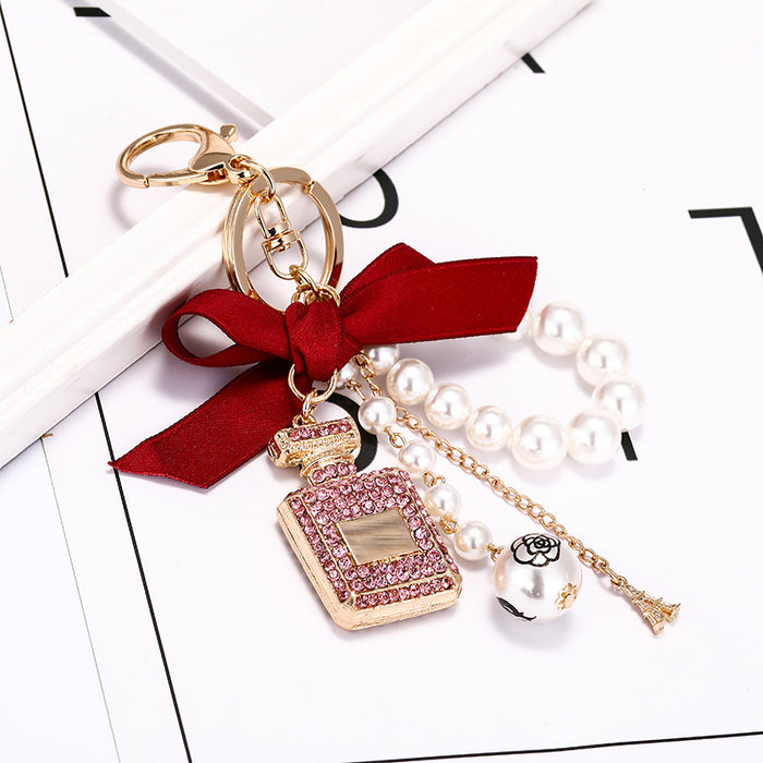 Wholesale Diamond Perfume Bottle Bow Pearl Alloy Keychain JDC-KC-CH120