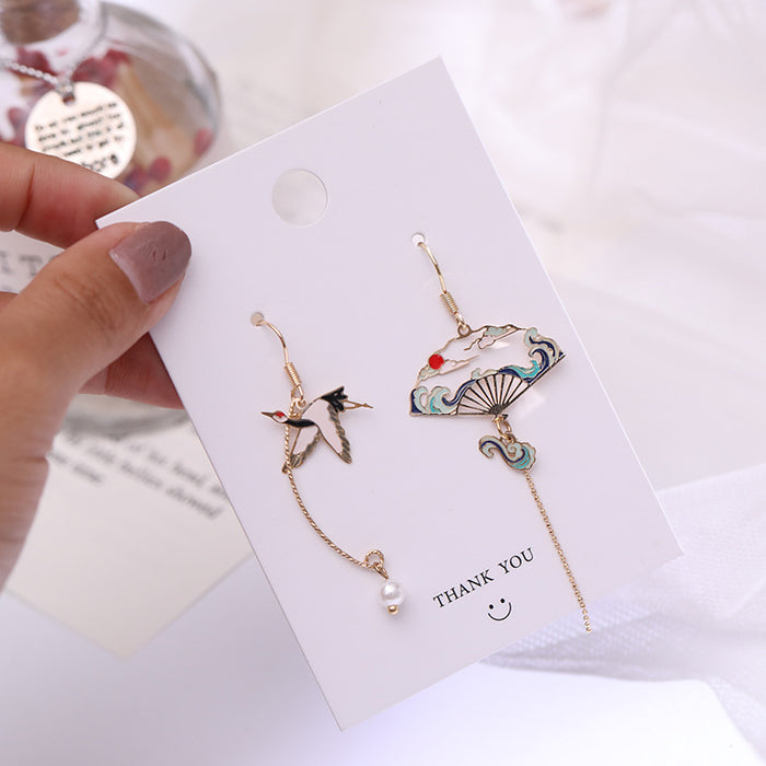 Wholesale Silver ear hook creative personality asymmetric tassel earrings
