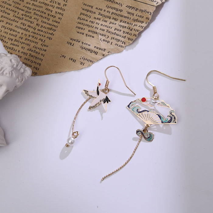 Wholesale Silver ear hook creative personality asymmetric tassel earrings