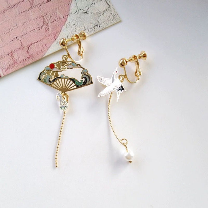 Wholesale Silver ear hook creative personality asymmetric tassel earrings