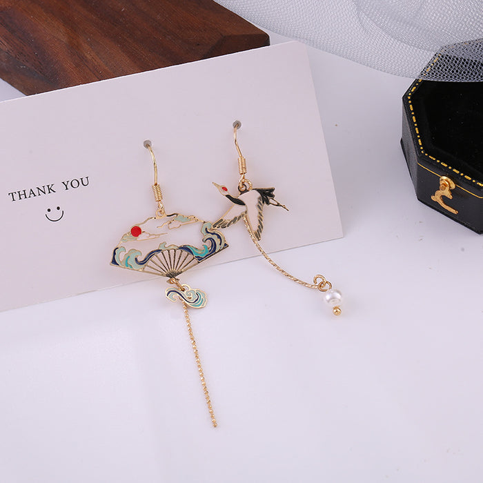 Wholesale Silver ear hook creative personality asymmetric tassel earrings