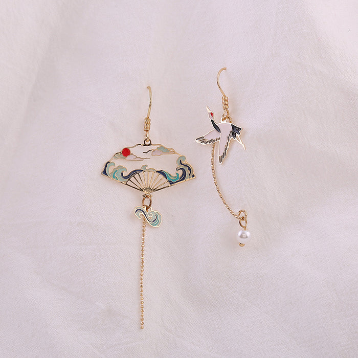Wholesale Silver ear hook creative personality asymmetric tassel earrings