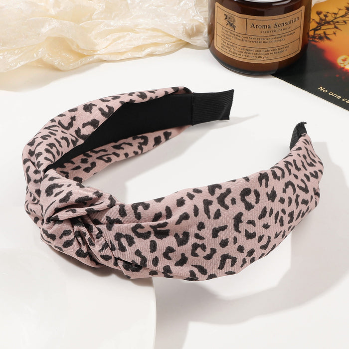 Wholesale Wide Edge Simple Fabric Leopard Knotted Headband JDC-HD-Yiyue001