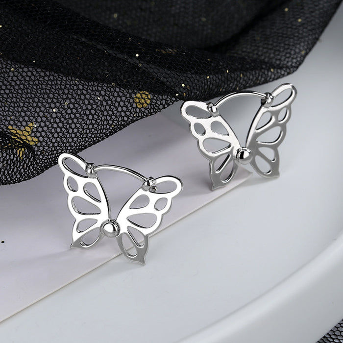 Wholesale Cute earrings with artistic niche design, hollowed out butterfly ear buckle earrings