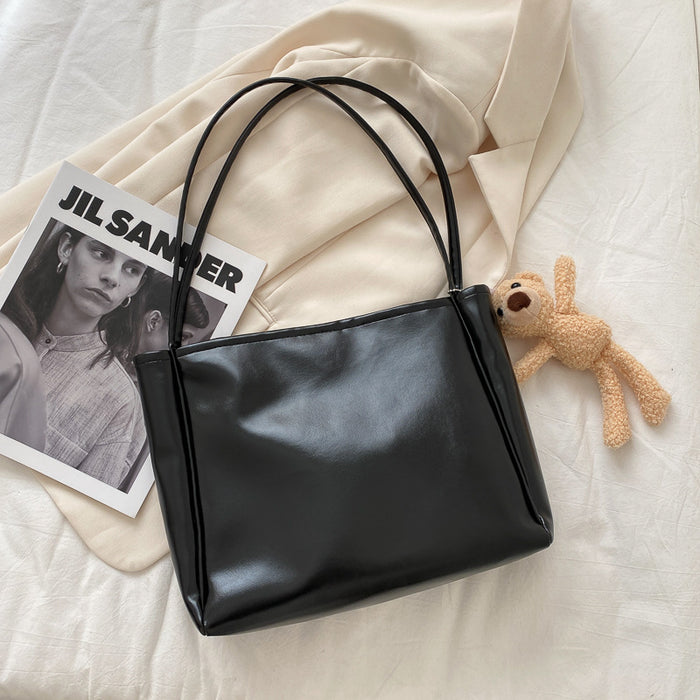 Wholesale Tote bag with simple temperament, large capacity shoulder bag, casual crossbody bag