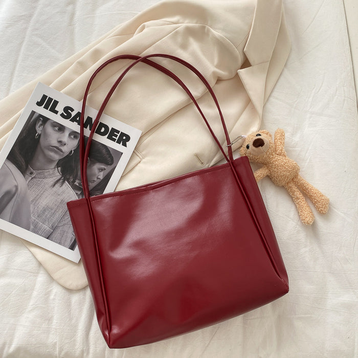 Wholesale Tote bag with simple temperament, large capacity shoulder bag, casual crossbody bag