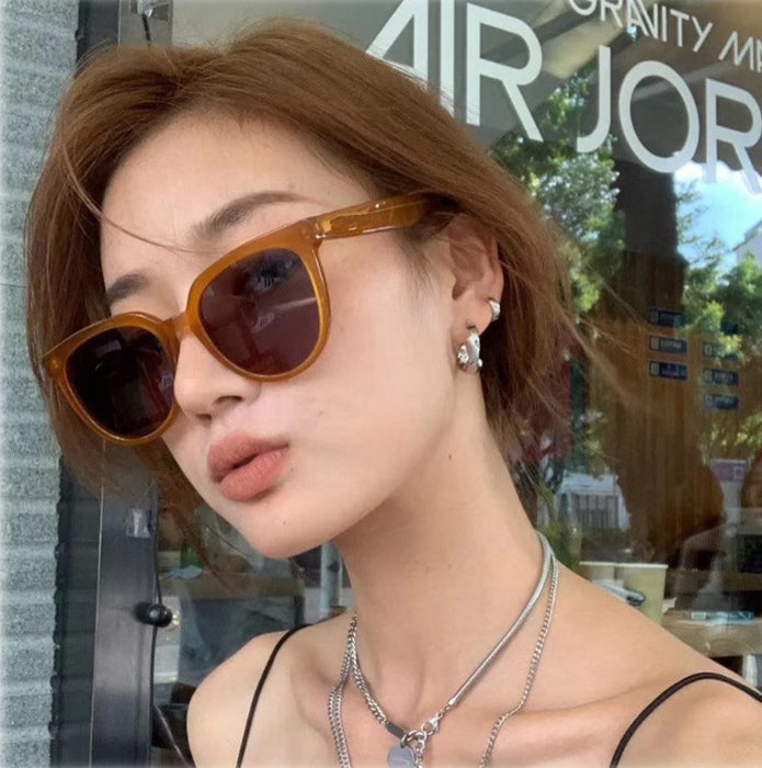 Wholesale Tea colored sunglasses for women, versatile, classic, face enhancing, small, polarized sunglasses