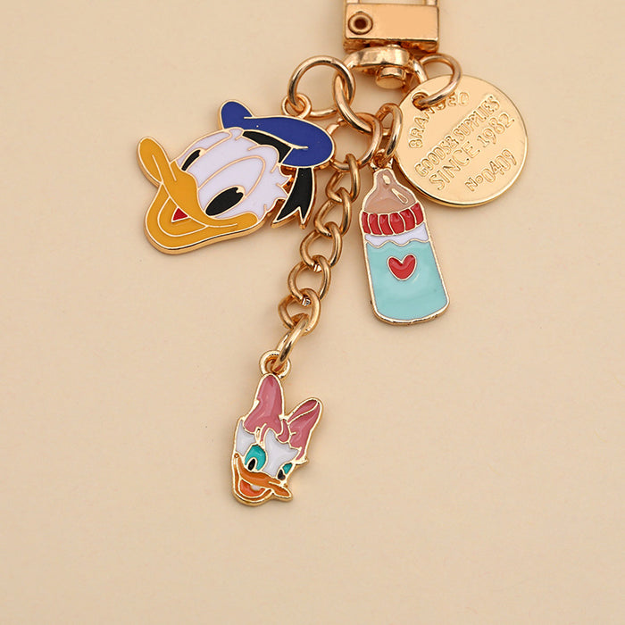 Wholesale  Cartoon Metal Duck Keychain Couple airpods Headset Pendant Car Key Chain