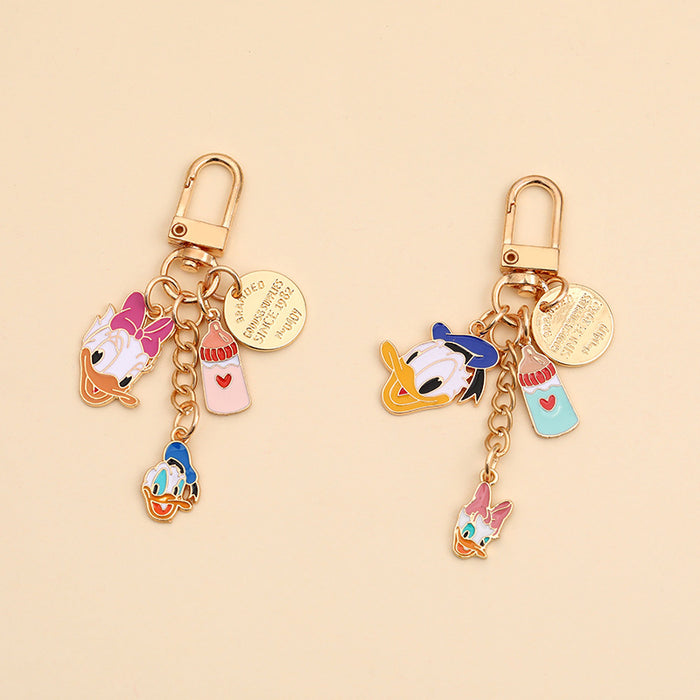 Wholesale  Cartoon Metal Duck Keychain Couple airpods Headset Pendant Car Key Chain