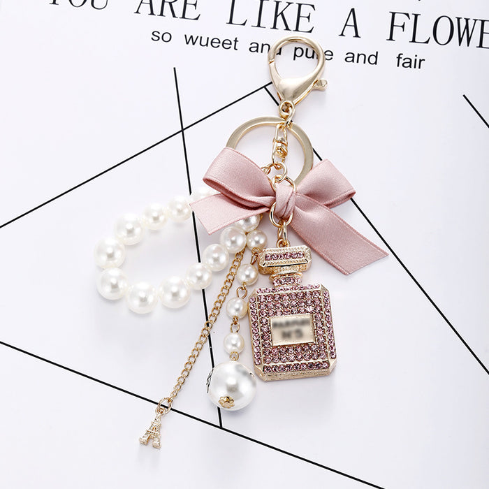 Wholesale Diamond Perfume Bottle Bow Pearl Alloy Keychain JDC-KC-CH120