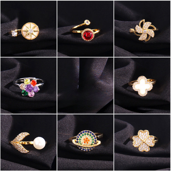 Wholesale Rotating Four Leaf Clover Cat's Eye Stone Copper Ring JDC-RS-RongChu001