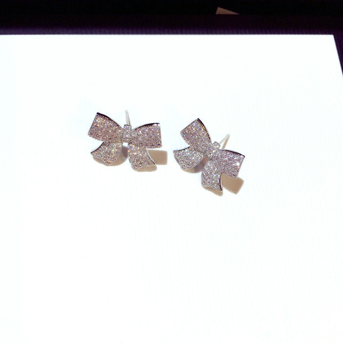 Wholesale Silver needle earrings, fashionable and exquisite, super sparkling zircon temperament, bow earrings, earrings, earrings, pendants