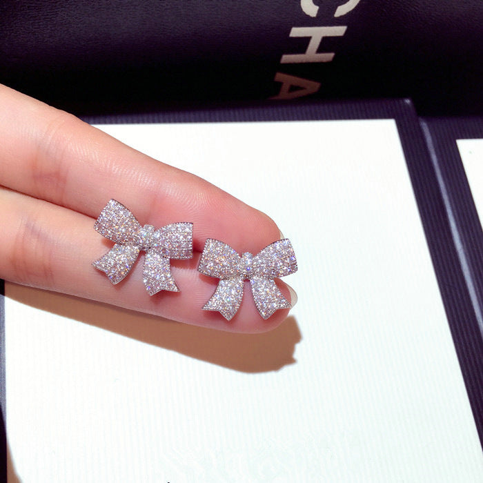 Wholesale Silver needle earrings, fashionable and exquisite, super sparkling zircon temperament, bow earrings, earrings, earrings, pendants