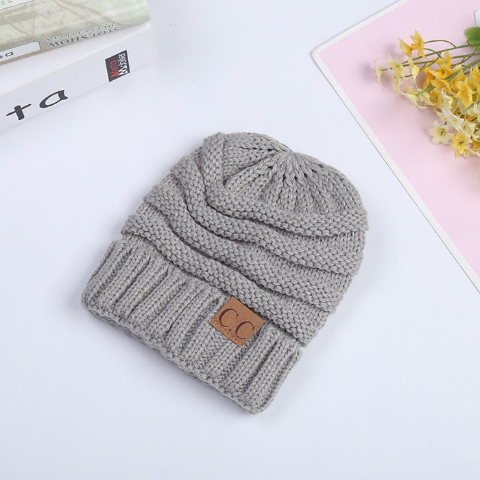 Wholesale Autumn and Winter Children's C Label Can Be Labeled with Versatile Yarn Edge Knitted Cap JDC-FH-HengYu005