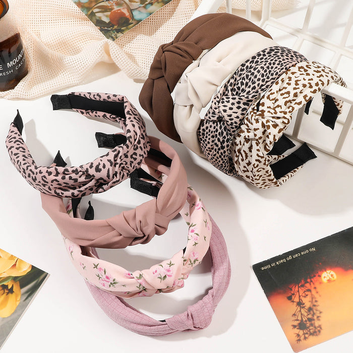 Wholesale Wide Edge Simple Fabric Leopard Knotted Headband JDC-HD-Yiyue001