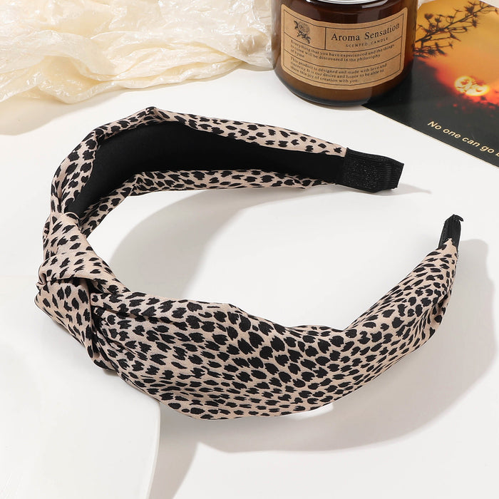 Wholesale Wide Edge Simple Fabric Leopard Knotted Headband JDC-HD-Yiyue001