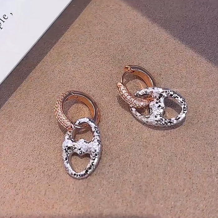 Wholesale 24K gold electroplated pig nose earrings with strong color retention,  luxurious and high-end feel,  CNC-machined delicate round two-tone earrings.