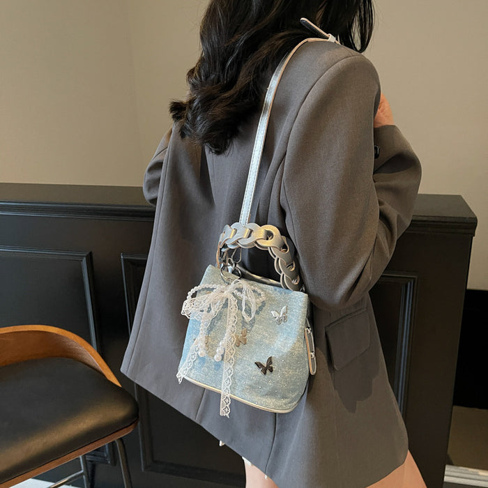 Wholesale Butterfly decoration shoulder crossbody bag, new niche design, drawstring bucket bag