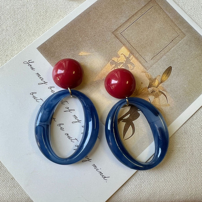 Wholesale Red and blue contrasting geometric ring earrings exude a literary and artistic atmosphere, with personalized and niche earrings for women