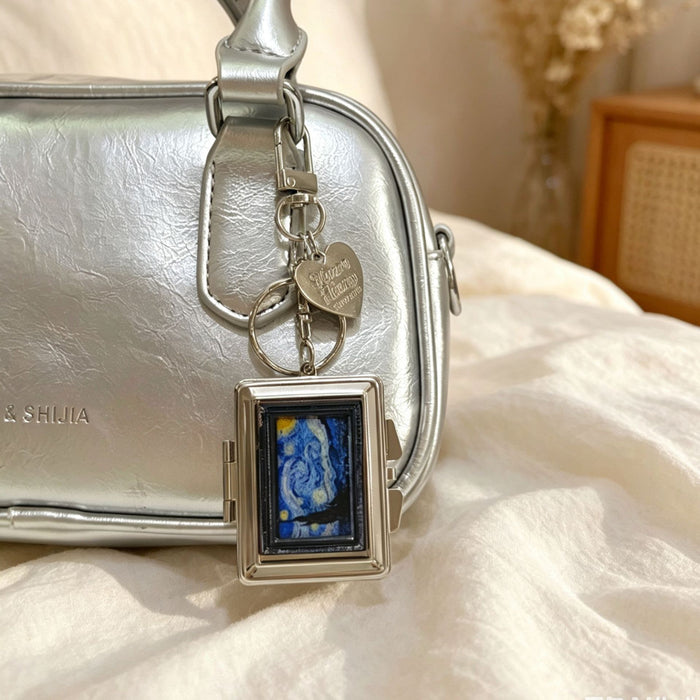 Wholesale Double-Sided Cosmetic Mirror Mona Pattern Bag Charm Keychain Zinc Alloy Boutique