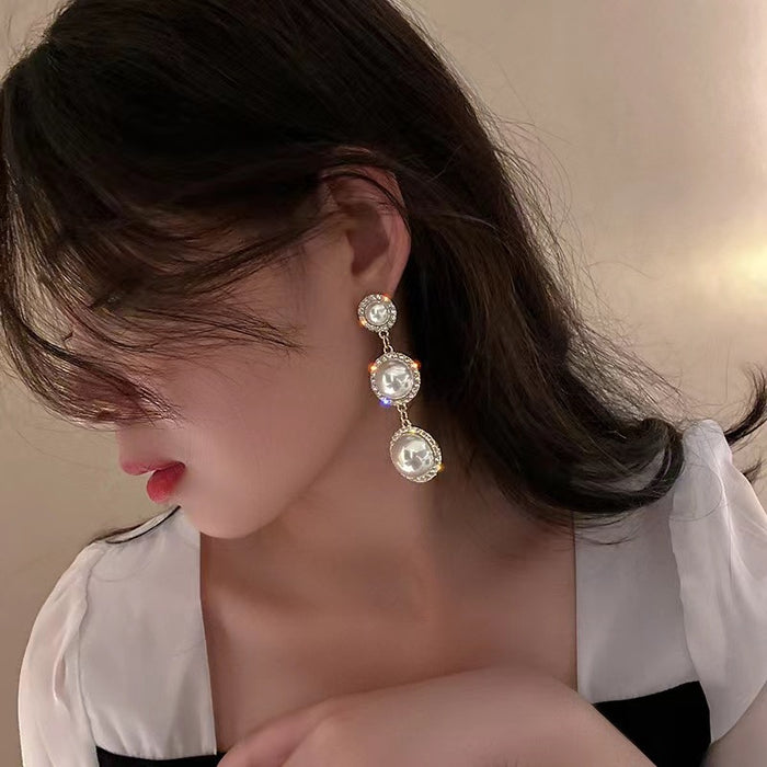 Wholesale Simple temperament pearl tassel earrings silver fashionable design earrings