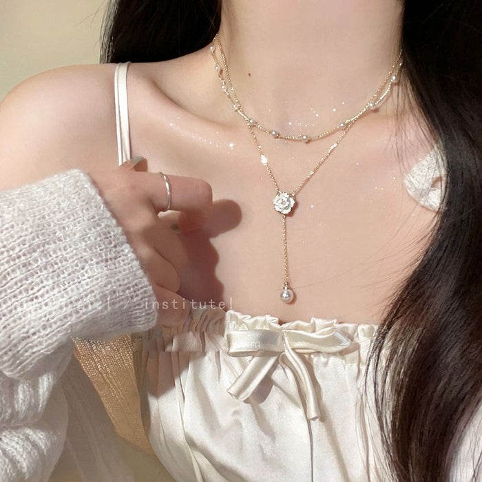 Wholesale Double layer pearl necklace for women, light luxury, high-end, niche design, neck chain, temperament, tassel collarbone chain