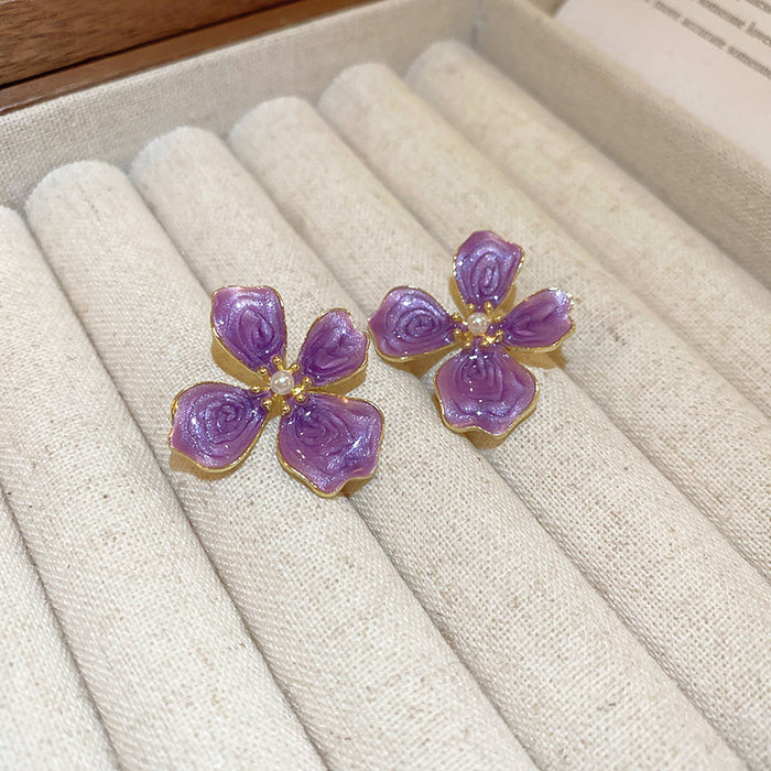 Wholesale A niche retro oil dripping purple four leaf flower earring design with a unique, simple, versatile temperament and fashionable style