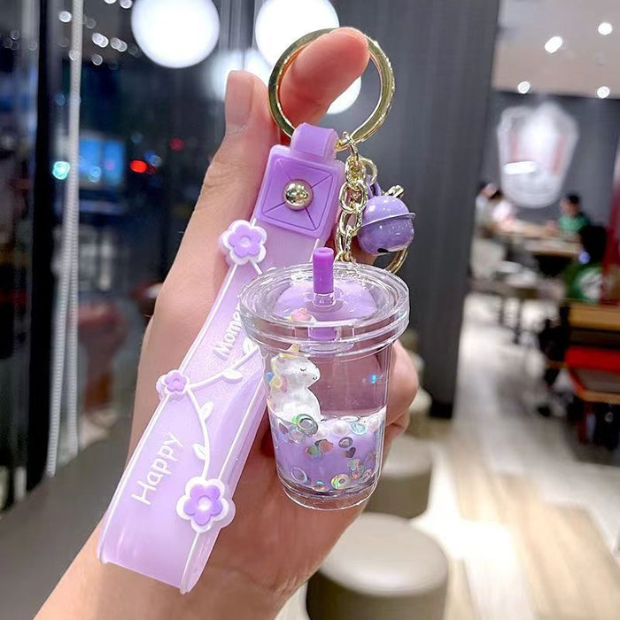 Wholesale Cute milk tea cup unicorn oil quicksand key chain rainbow horse bag hanging ornaments grab baby machine small gifts