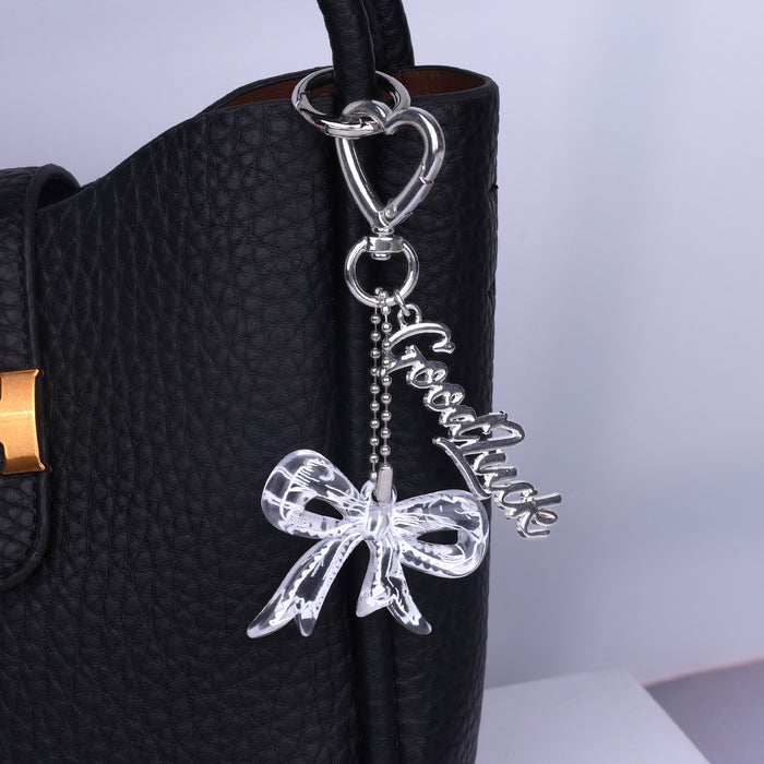 Wholesale Trendy black and white transparent bow acrylic heart keychain bag pendant personalized letter creative accessories