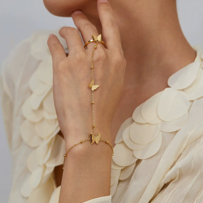 Wholesale Fashion girl bracelet with frosted butterfly titanium steel beads, adjustable opening ring, finger chain