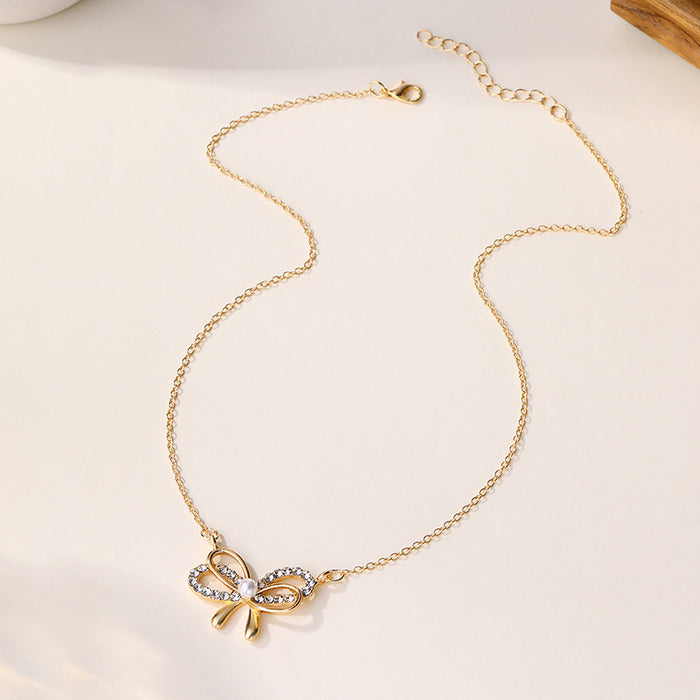 Wholesale Personalized design of jewelry, alloy bow pendant, versatile, simple, diamond studded bow necklace