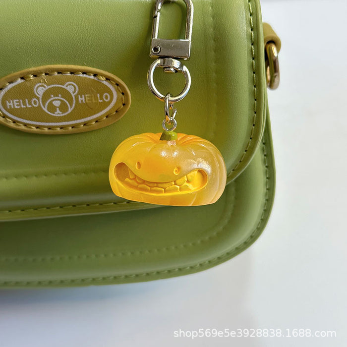 Wholesale Novelty  Pumpkin Pendant Keychain Glow In The Dark Resin Black Hat Design Bag And Earphone Case Charm Gift For Students And Couples