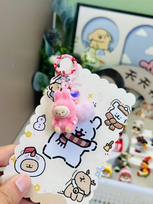 Wholesale Cute mini flocked sitting posture toy