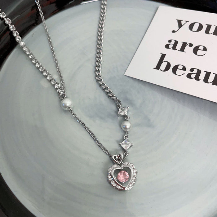 Wholesale Light luxury pearl heart-shaped zircon titanium steel necklace, versatile and high-end, collarbone chain splicing necklace