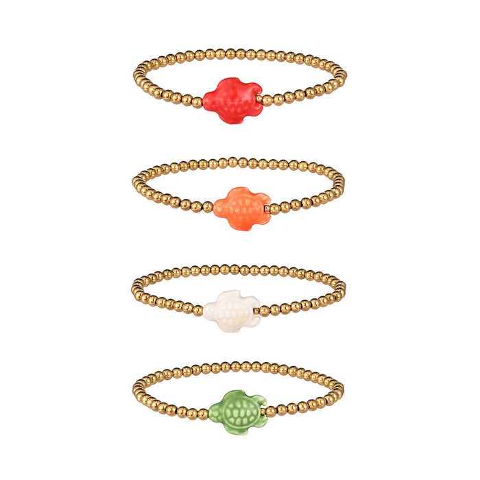 Wholesale Swimming wearable mini bracelet accessory ceramic conch animal turtle titanium steel non fading bracelet