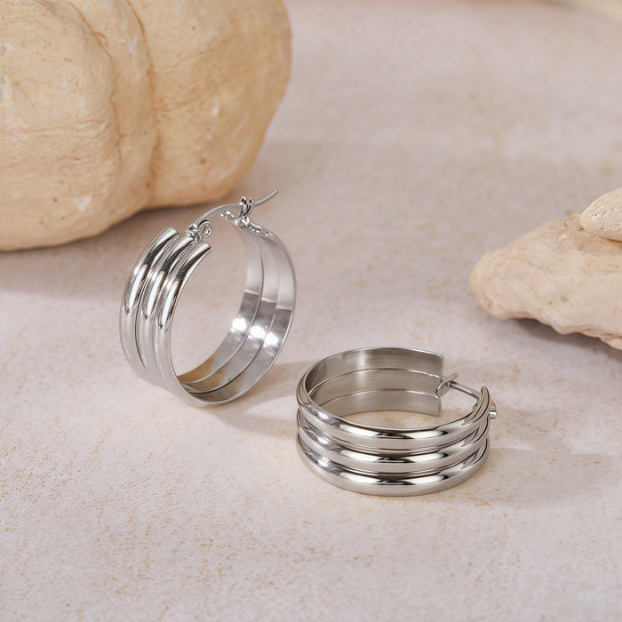 Wholesale Geometric Titanium Steel Three-Line Dense Earrings