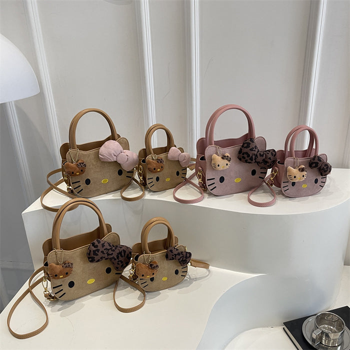 Wholesale Cute cartoon shoulder bag with leopard print bow.