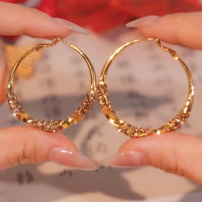Wholesale Diamond studded twisted circle earrings for women with exaggerated design, unique personality, and retro style earrings