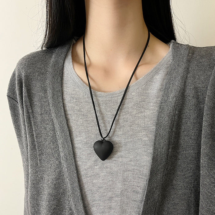 Wholesale Love pendant necklace, long leather rope adjustable sweater chain, high-end sweatshirt accessory