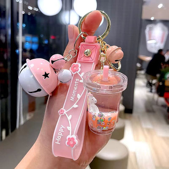 Wholesale Cute milk tea cup unicorn oil quicksand key chain rainbow horse bag hanging ornaments grab baby machine small gifts