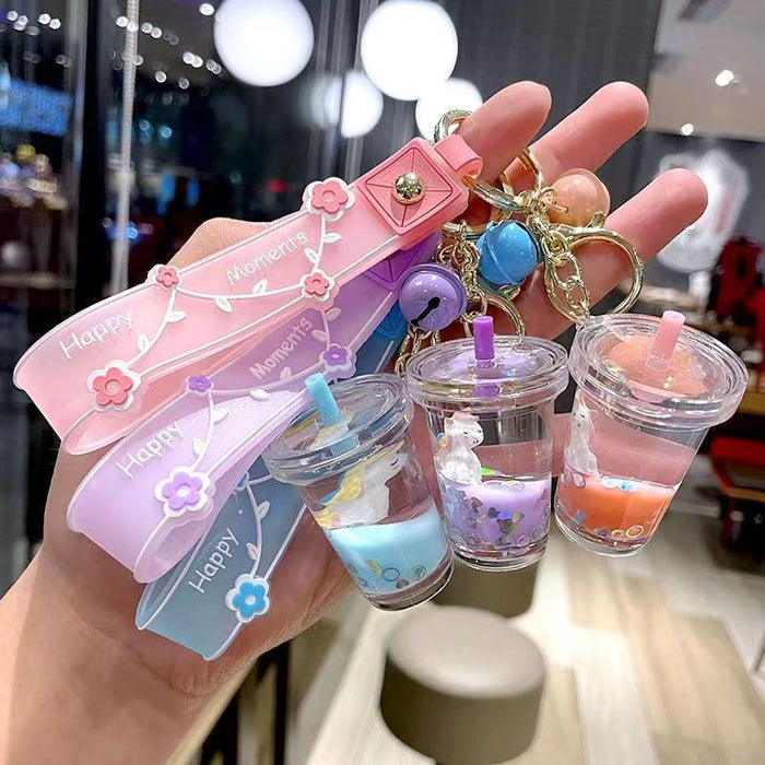 Wholesale Cute milk tea cup unicorn oil quicksand key chain rainbow horse bag hanging ornaments grab baby machine small gifts