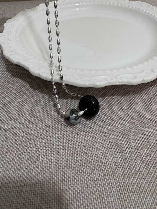 Wholesale Simple natural stone donut water droplet tiger eye pendant necklace, niche high-end sweater chain