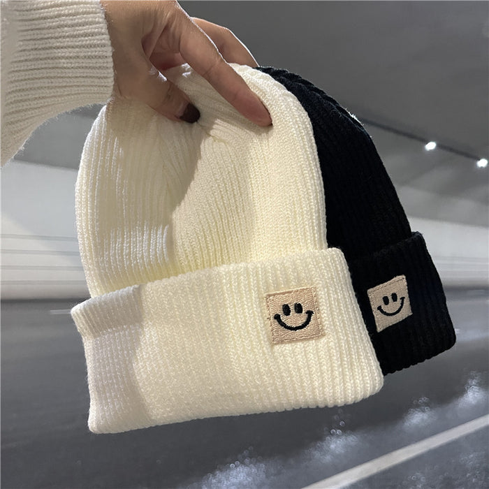 Wholesale Autumn and Winter Cute Smiley Face Logo Wool Knitted Hat JDC-FH-Yizhan002