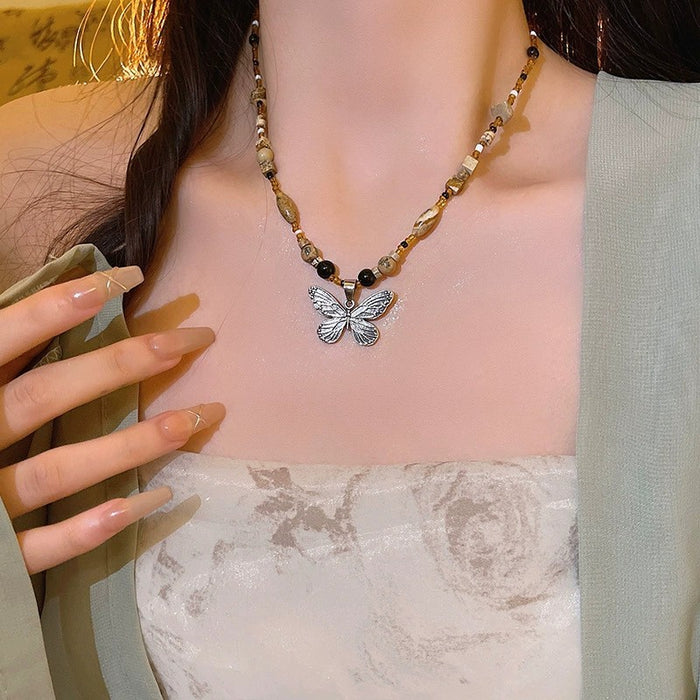 Wholesale Vintage feather necklace, double-layer layered long sweater chain accessory