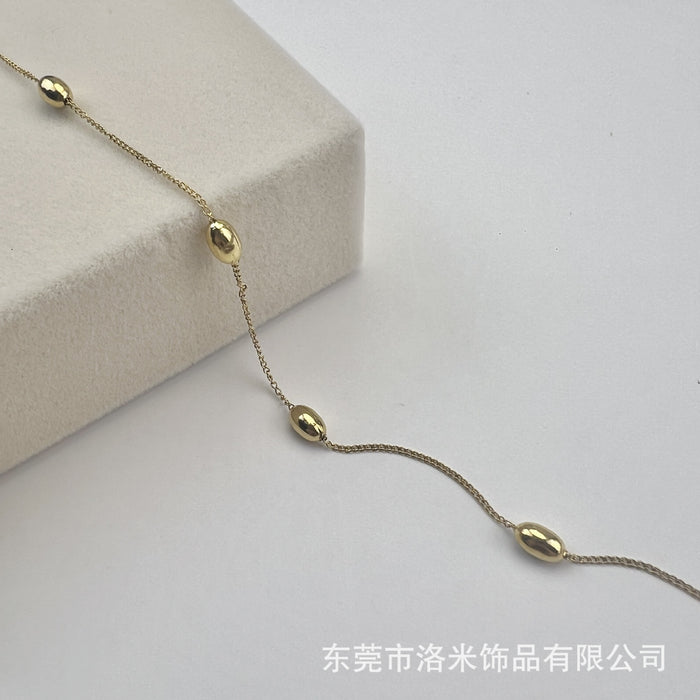 Wholesale Unique and niche gold bean bracelet with fashionable and minimalist design